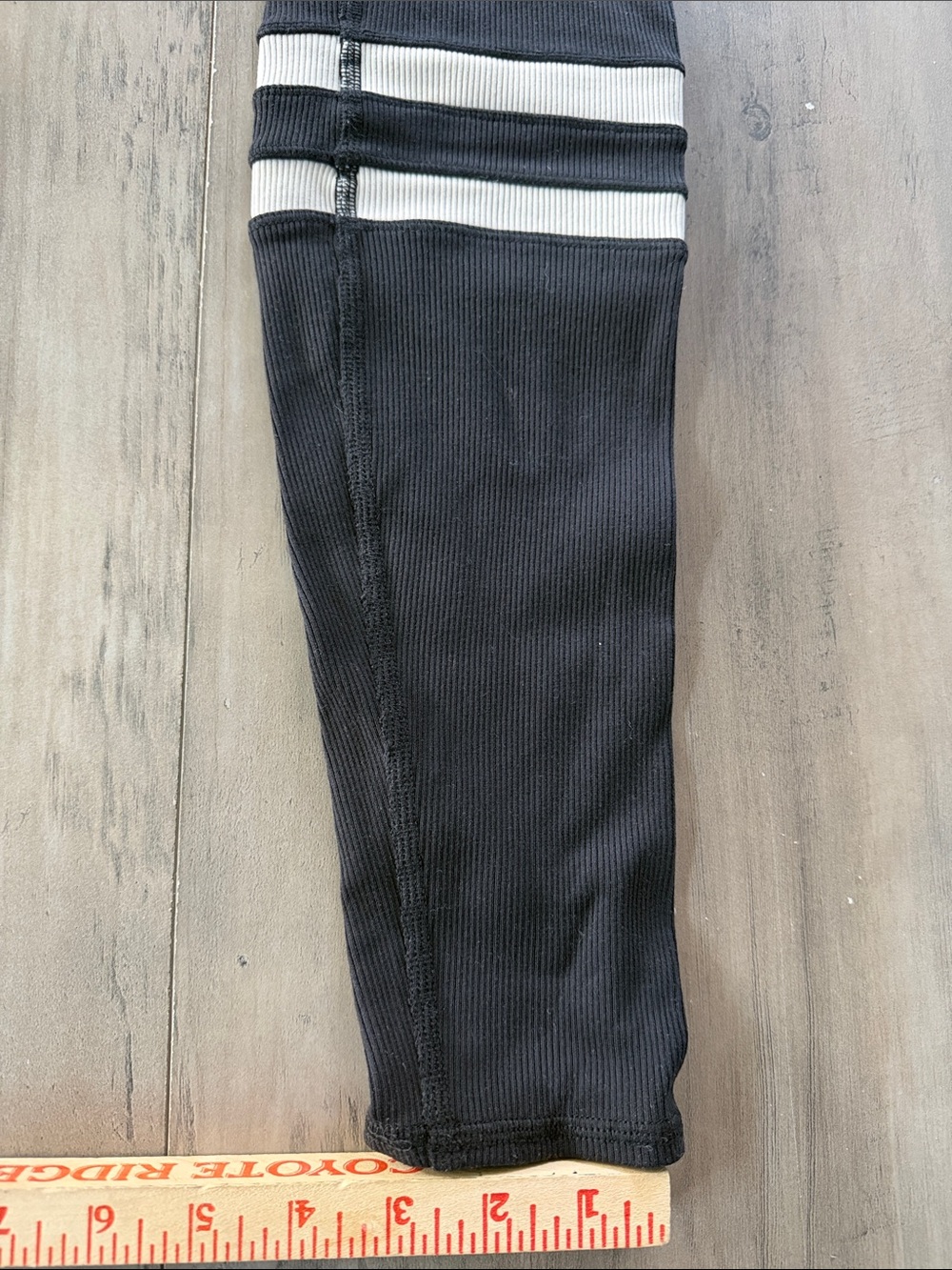 Alo Medium Ribbed Black Leggings with White Striped Knee Details - Picture 6 of 11
